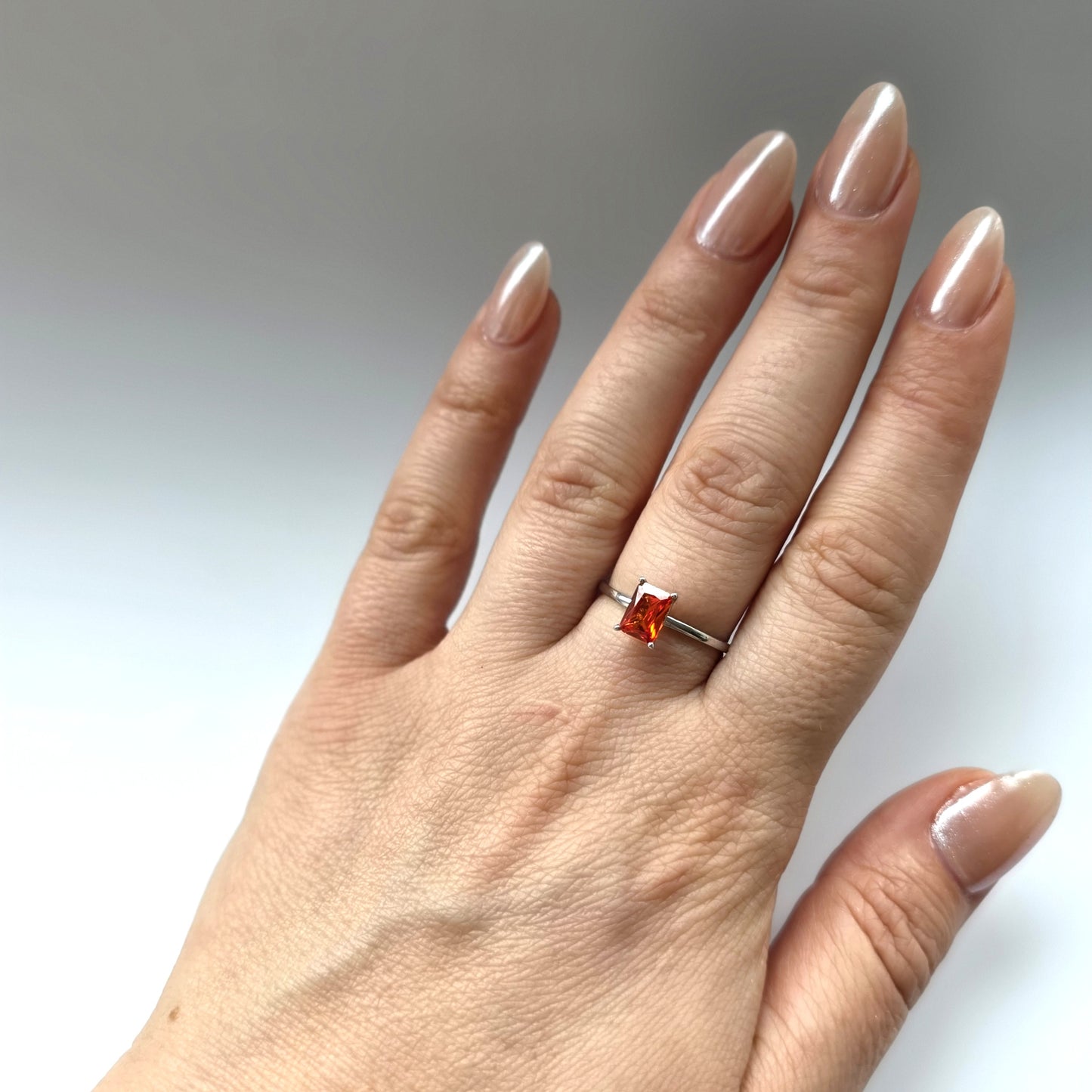Nexus Solitaire Ring – Orange Padparadscha Sapphire