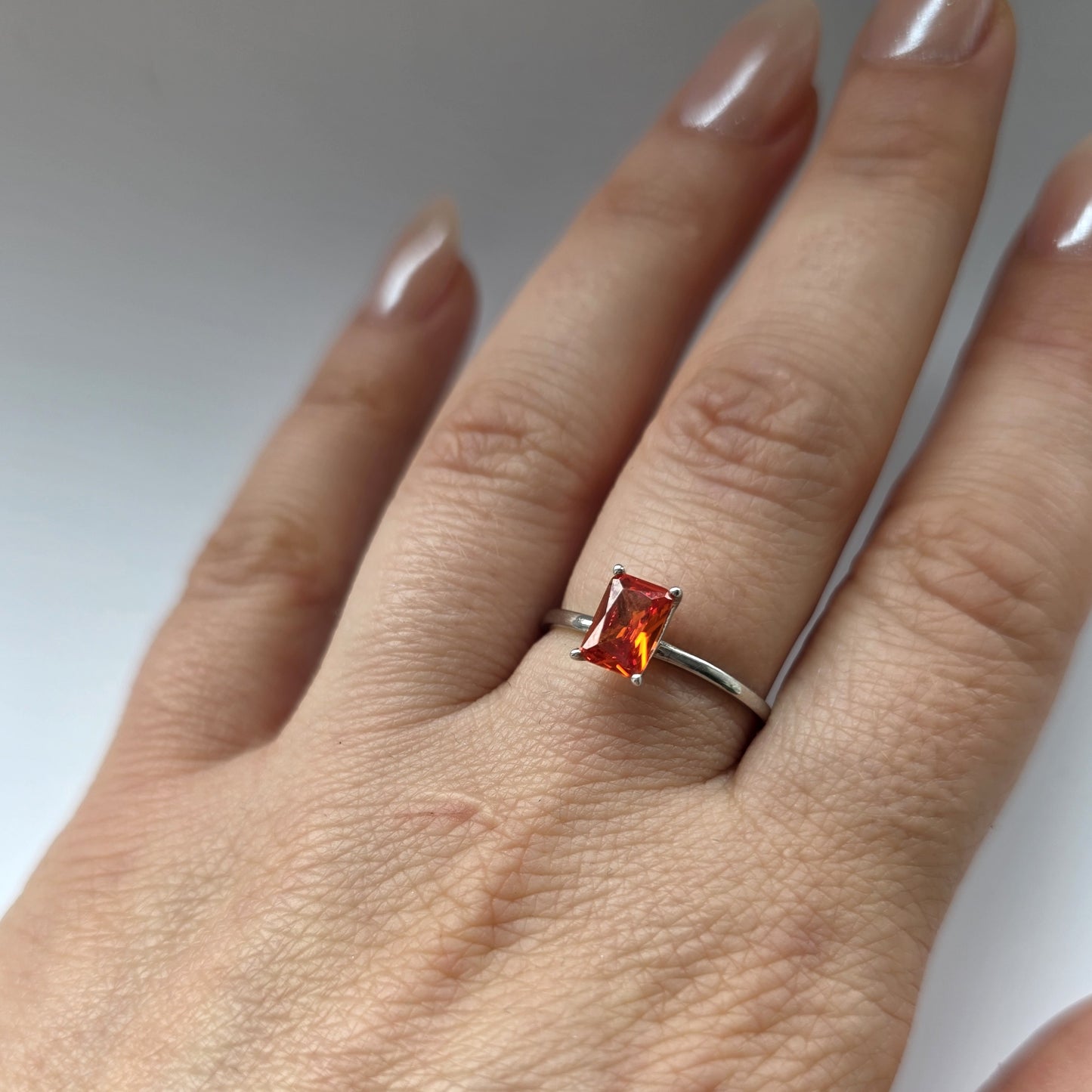 Nexus Solitaire Ring – Orange Padparadscha Sapphire
