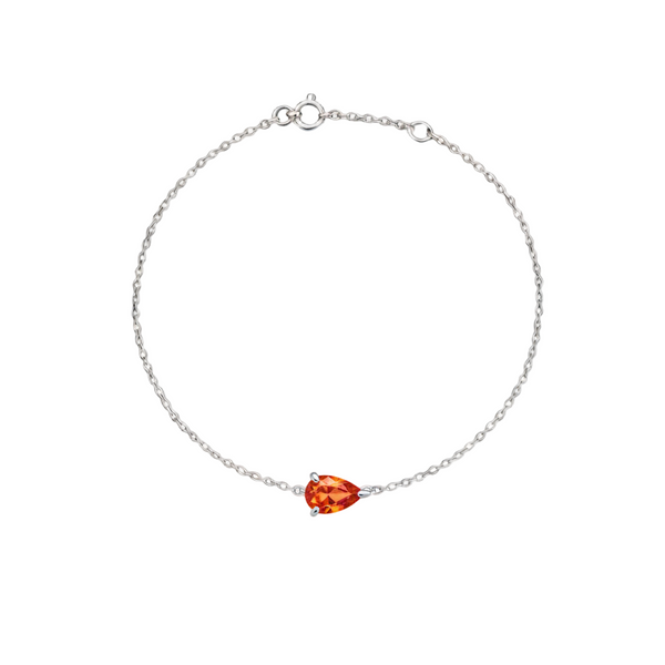 White gold bracelet with a pear cut orange sapphire, on a white background