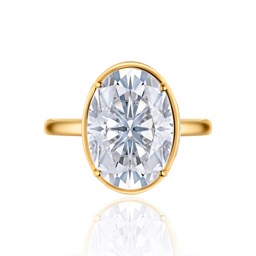 Gold ring with a large oval diamond and hidden halo on a white background