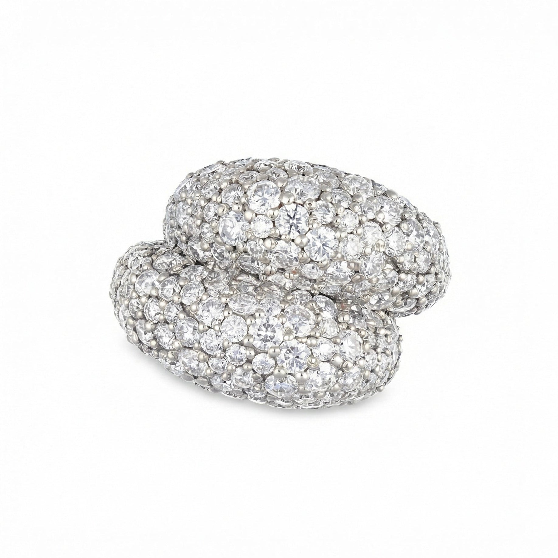 Large white gold and diamond fully pave knot ring on a white background 