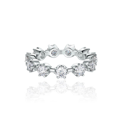 white gold ring with round cut diamonds in a vintage setting on a white background