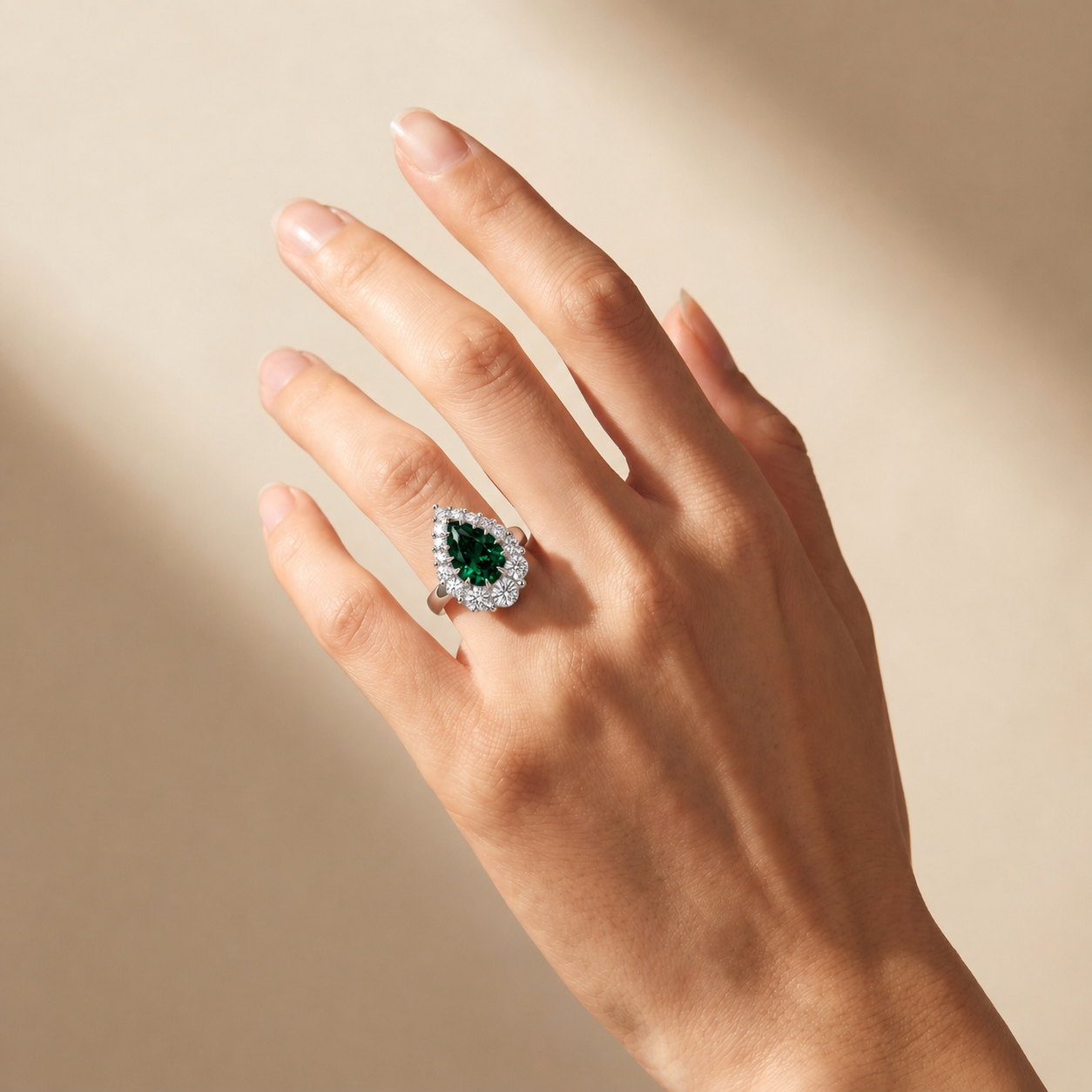 Nova Halo Ring – Zambian Green Emerald