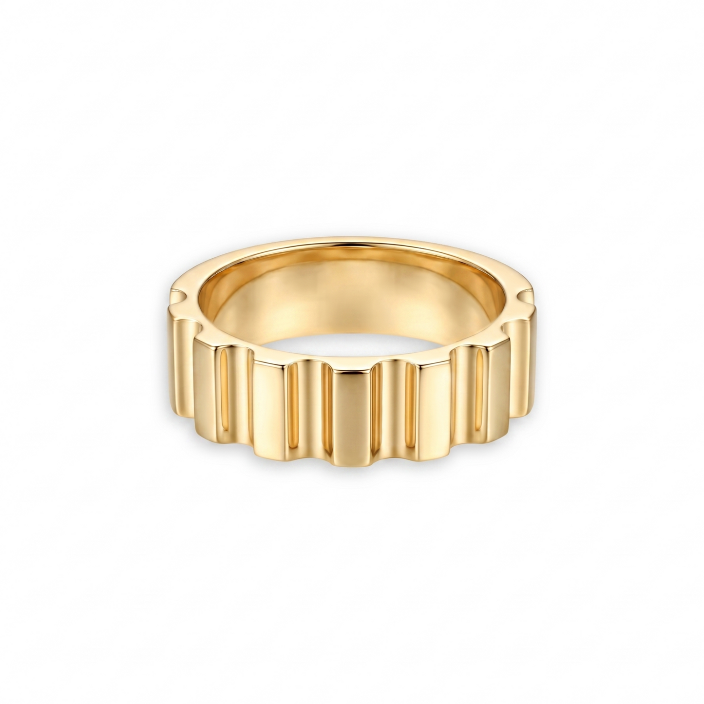 Gold ring with a textured design, gear like appearance on a white background
