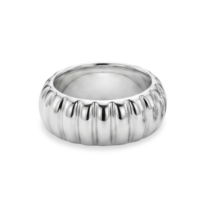 white gold ring with a ribbed texture on a white background