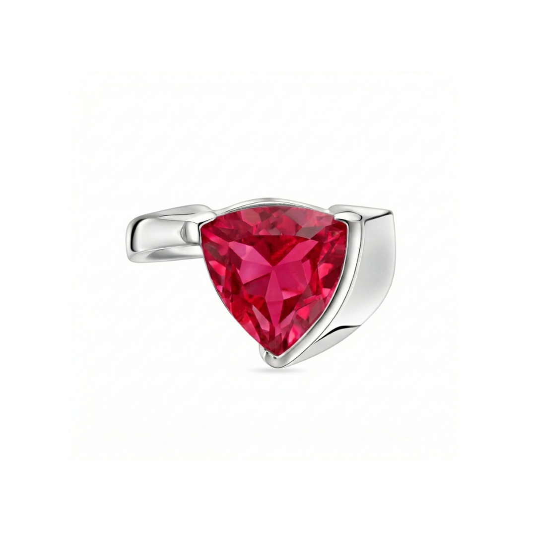 white gold ring with a trillion cut ruby half bezel set, it has a sculptural, modern look; the ring is shown on a white background.