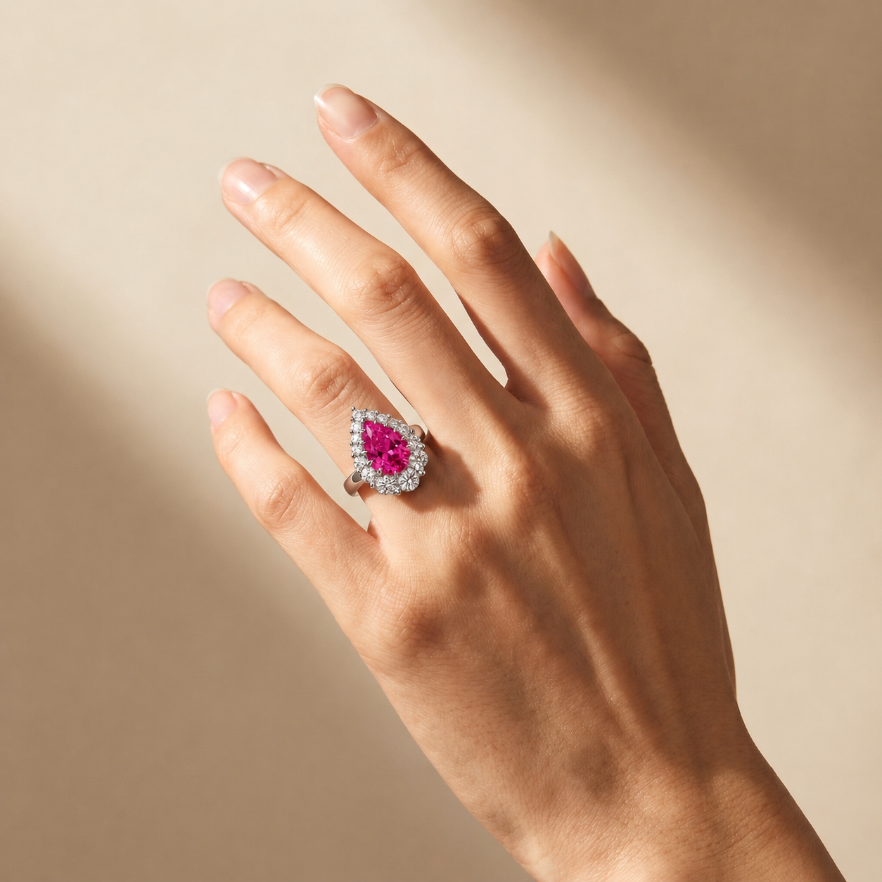 Nova Halo Ring – Vivid Pink Sapphire