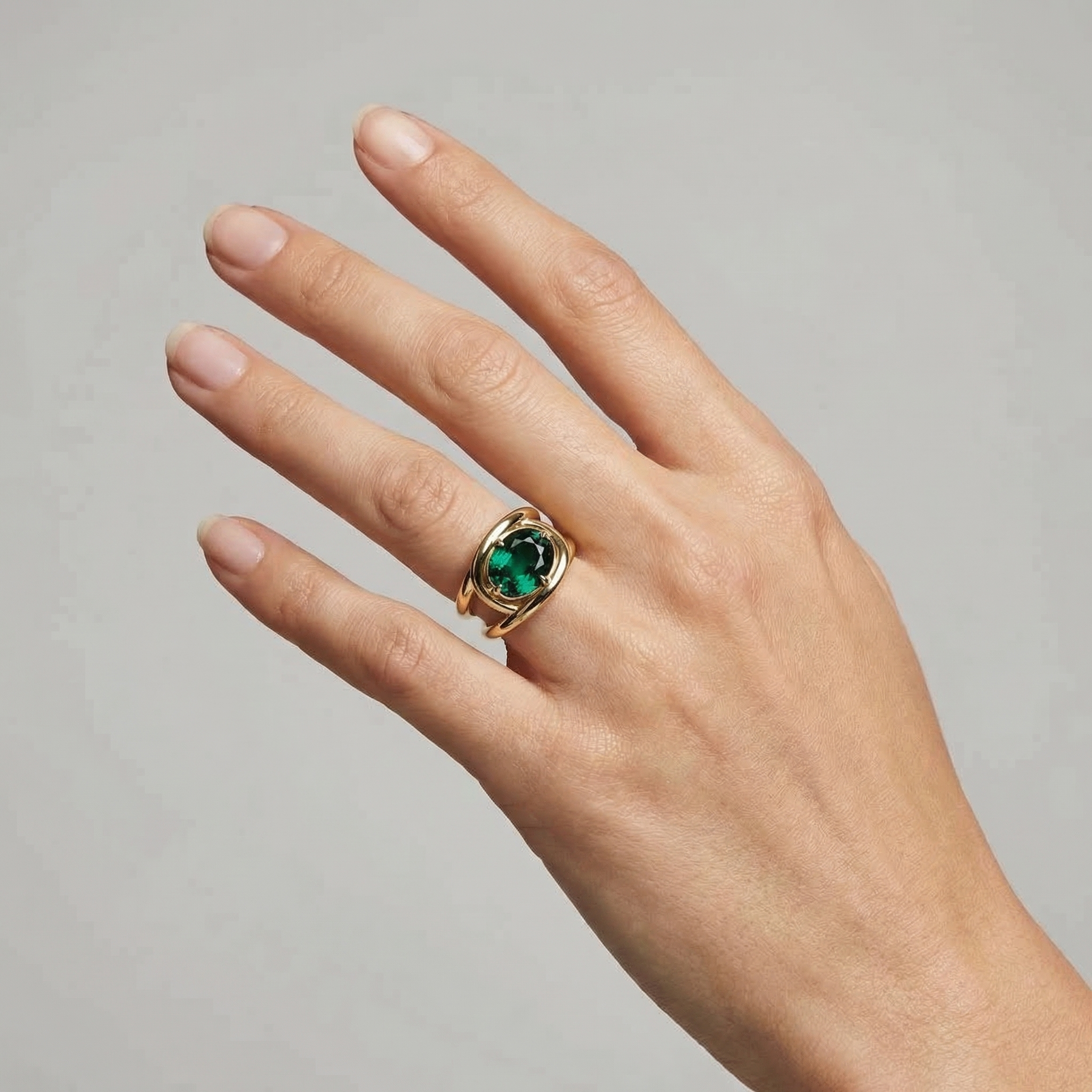 Velara Twist Ring – Zambian Green Emerald