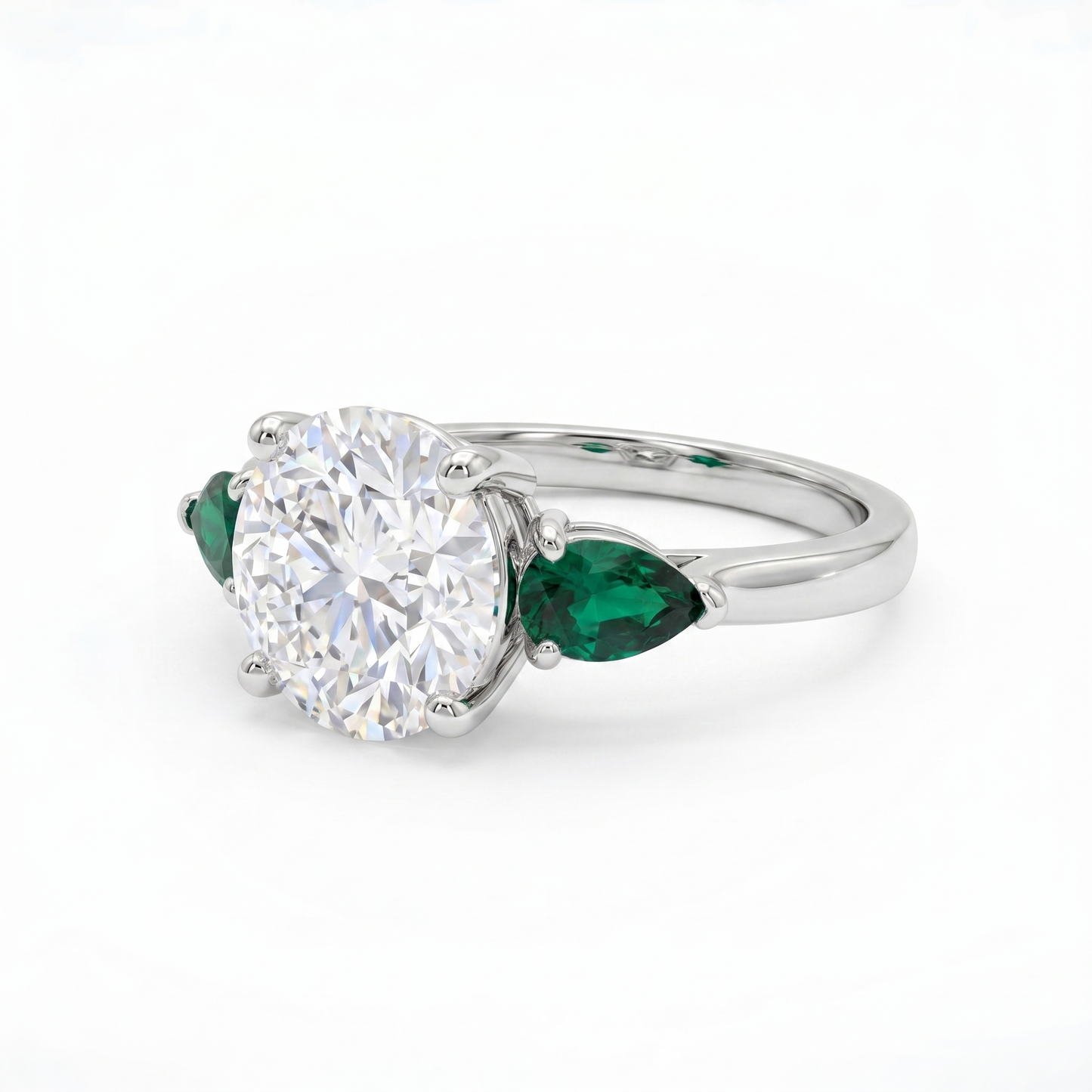 Juno Trio Ring – Zambian Green Emerald